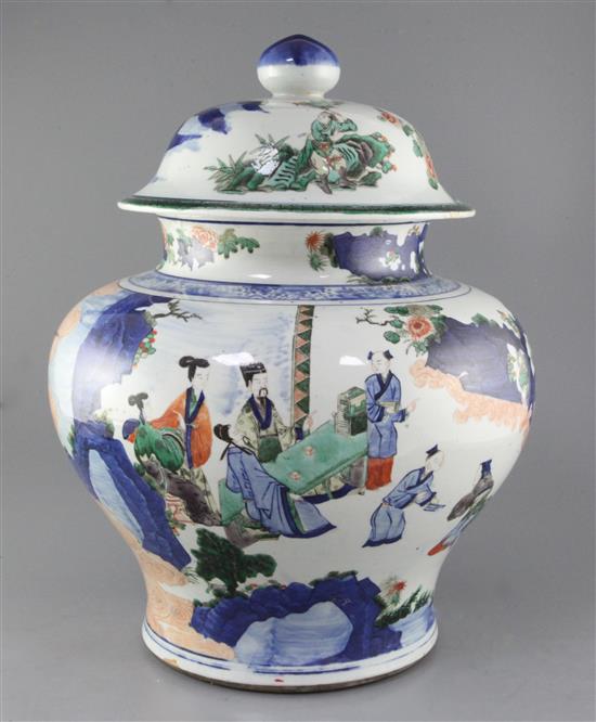 A massive Chinese wucai baluster jar and cover, early Kangxi period, c.1670, approx. height 50cm width 37cm, slight faults